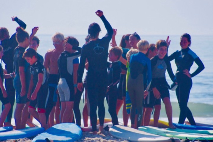 a group of people on a beach