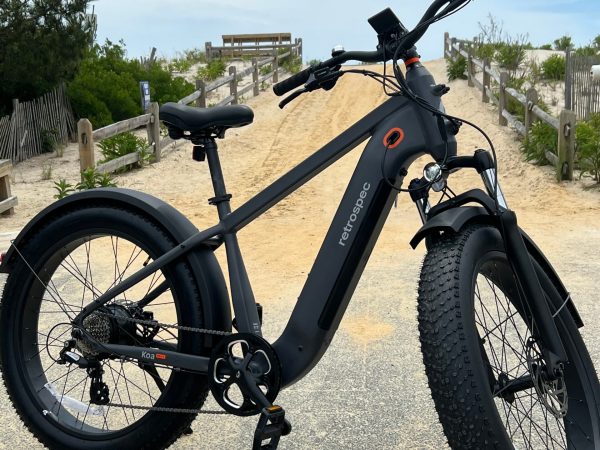 a bicycle is parked next to a motorcycle